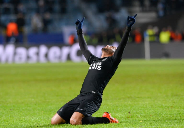 Paris Saint-Germain's midfielder Lucas celebrates after scoring a goal during a UEFA Champions League match against Malmo in Malmo, Sweden on November 25, 2015