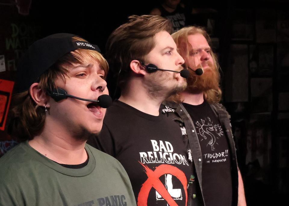 Oli Kuehn, John Connelly and Brian Corbett sing together in "Green Day's American Idiot" at The Academy Playhouse in Orleans.