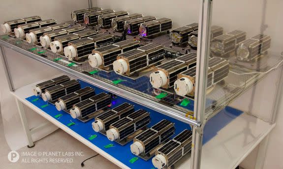 The 28 tiny satellites that will make up Planet Labs' "Flock 1" constellation of Earth-imaging spacecraft.