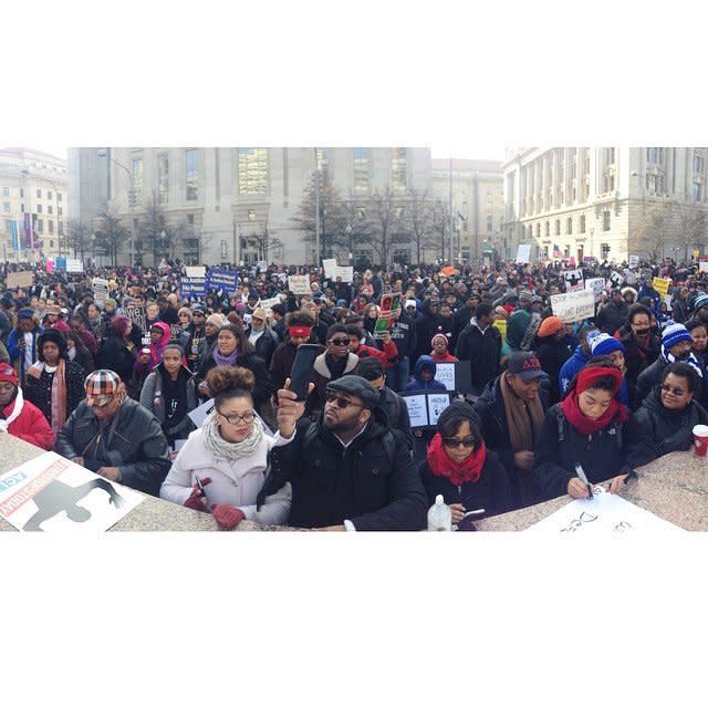 Protesters gather in Freedom Plaza before a march to the U.S. Capitol building in Washington, DC on Saturday, Dec. 13, 2014. 