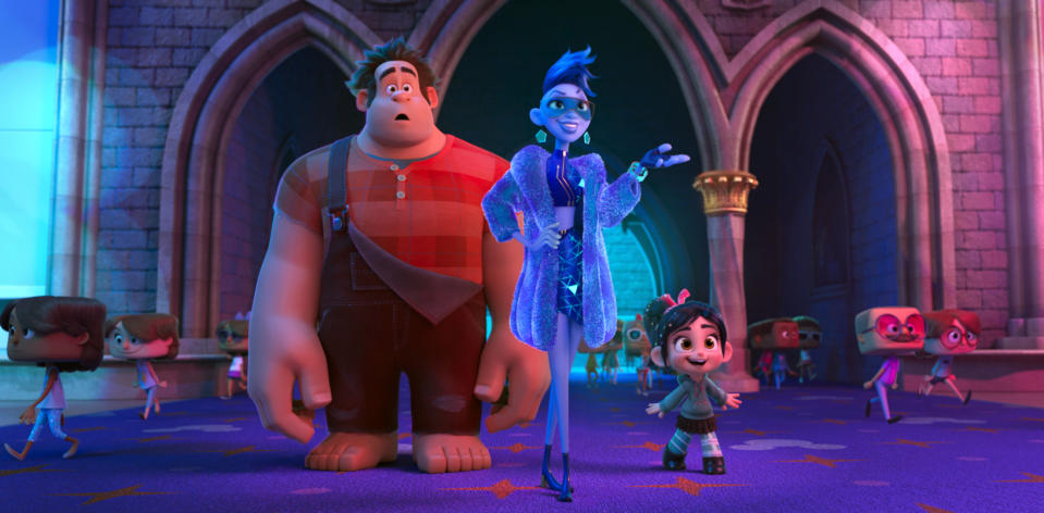 FILE - This image released by Disney shows characters, from left, Ralph, voiced by John C. Reilly, Yess, voiced by Taraji P. Henson and Vanellope von Schweetz, voiced by Sarah Silverman in a scene from "Ralph Breaks the Internet." On a quiet weekend at the box office, “Ralph Breaks the Internet” was No. 1 for the third straight week, while the upcoming DC Comics superhero film “Aquaman” made a huge splash in Chinese theaters. (Disney via AP, File)