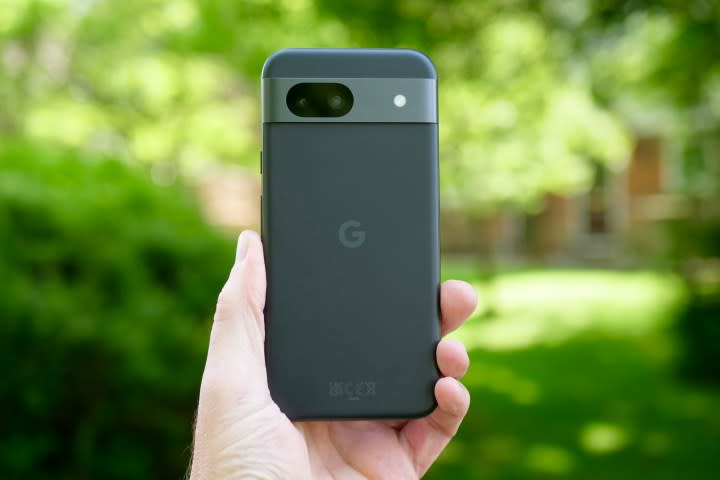 A person holding the Google Pixel 8a.