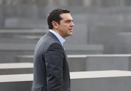 Greek Prime Minister Alexis Tsipras visits the Holocaust Memorial in Berlin March 24, 2015. REUTERS/Hannibal Hanschke