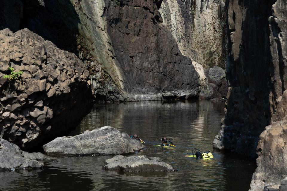 Dive teams from the National Park Service (NPS) conduct dive operations at The Paterson Great Falls in Paterson, NJ on Thursday Sept. 7, 2023. The goal of the dive to explore the waters above and below the Great Falls for archeological and public safety purposes. Water from the Passaic River was diverted away from the Falls and into the power plant so the dive team and boat could safely operate. Paterson Fire Department assisted the NPS.