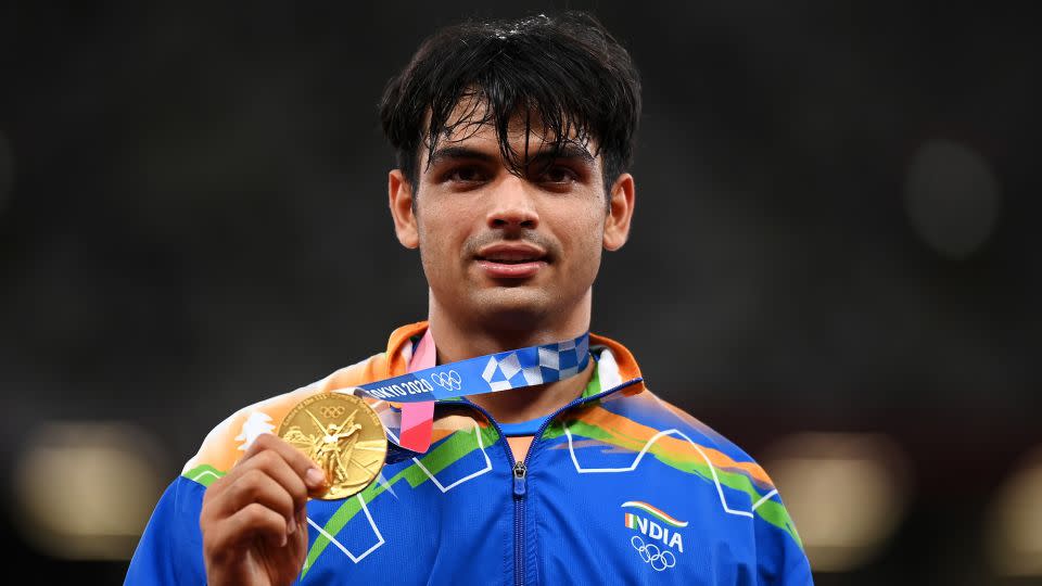 Chopra stands on the podium with his gold medal at the Tokyo Olympics. - Matthias Hangst/Getty Images