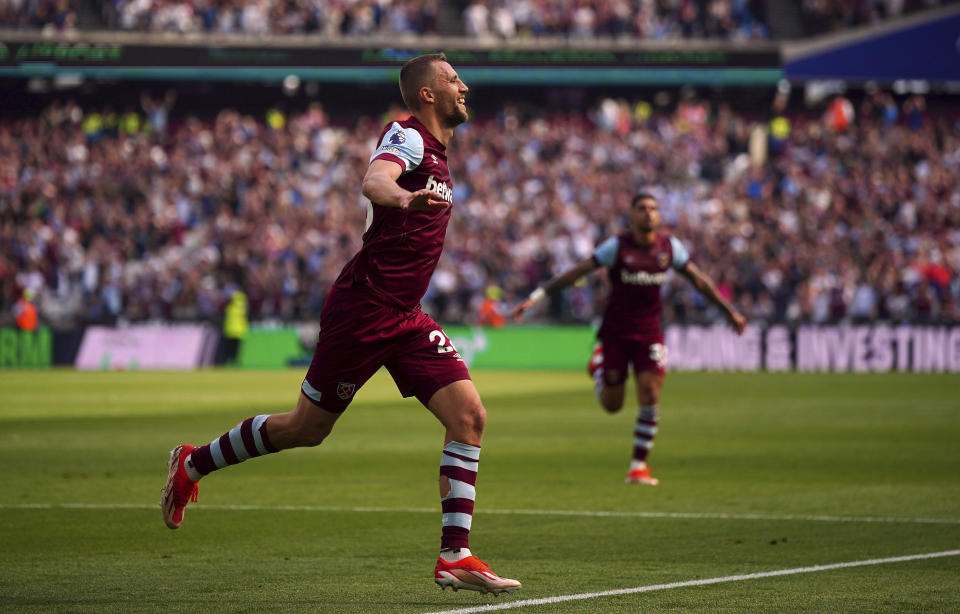 West Ham United's Tomas Soucek celebrates scoring his side's second goal during the English Premier League soccer between West Ham United and Luton Town match at the London Stadium, London, Saturday May 11, 2024. (Victoria Jones/PA via AP)