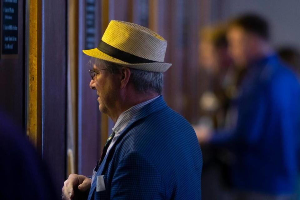 A person places a bet on the first day of Keeneland’s Spring Meet on Friday.