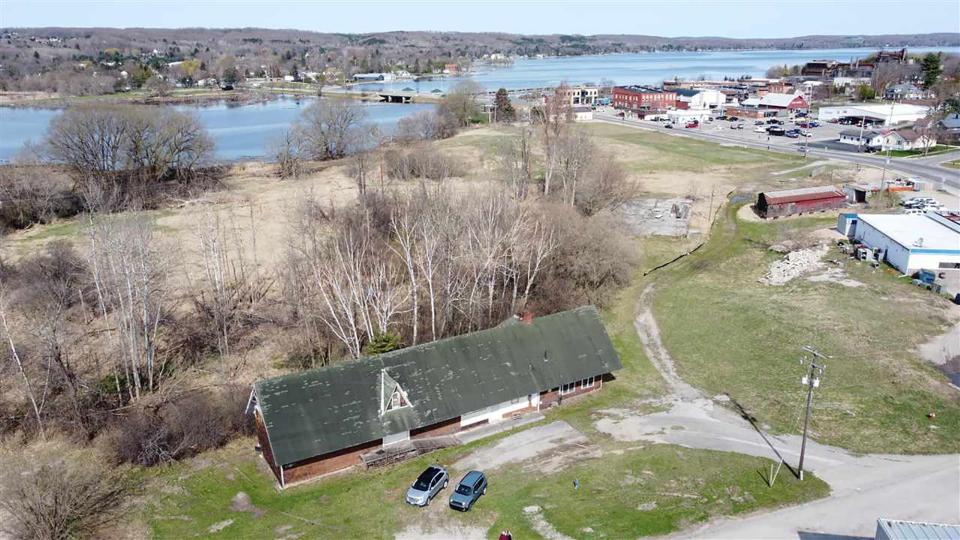 An aerial view a century-old, 4,200-square-foot train depot along with five acres at 204 Depot St., East Jordan, an Up North city. The property is now for sale. 