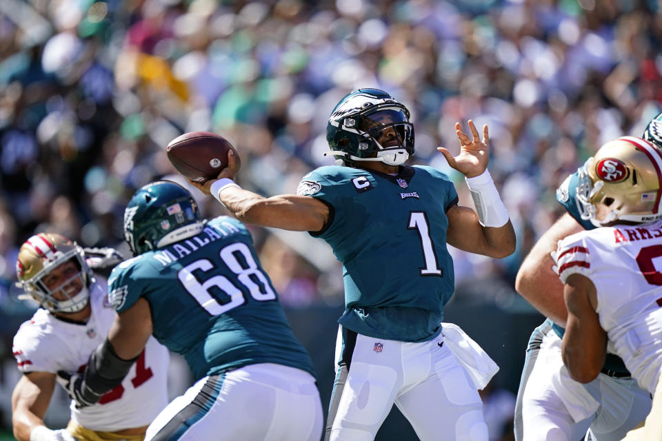 Philadelphia Eagles quarterback Jalen Hurts (1) looks to pass during the first half of an NFL football game against the San Francisco 49ers on Sunday, Sept. 19, 2021, in Philadelphia. (AP Photo/Matt Rourke)