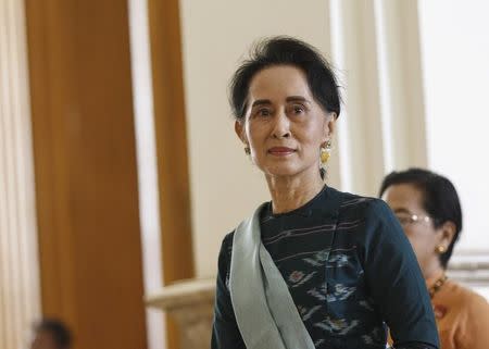 National League for Democracy (NLD) party leader Aung San Suu Kyi arrives at the Union Parliament in Naypyitaw, Myanmar March 15, 2016. REUTERS/Soe Zeya Tun