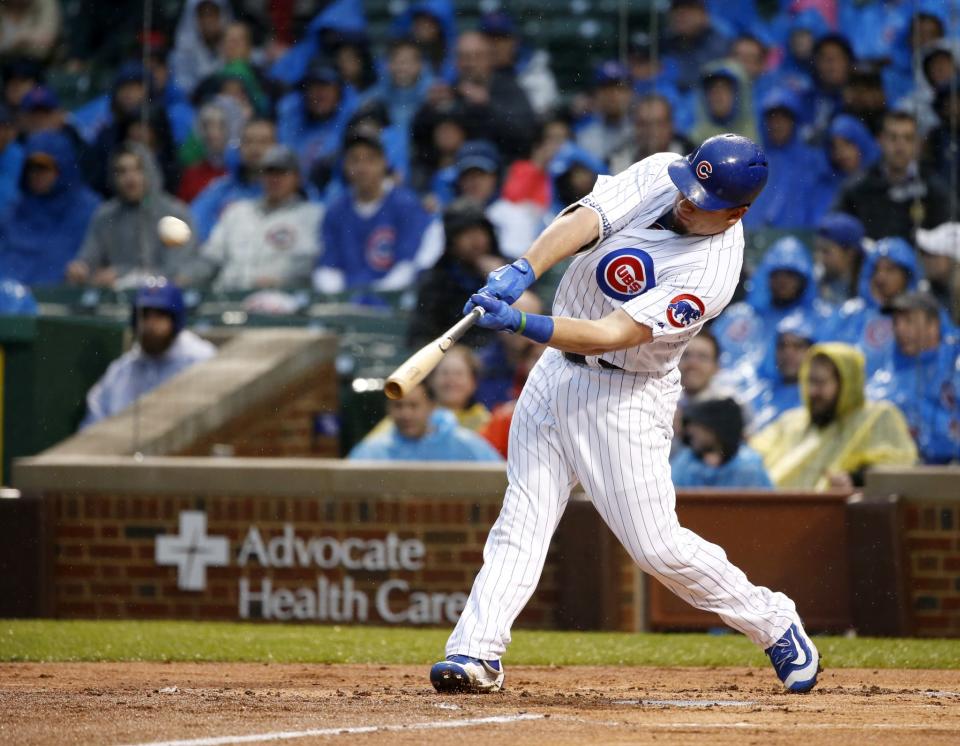 Kyle Schwarber bashed a Johnny Cueto pitch onto Sheffield Avenue. (AP)