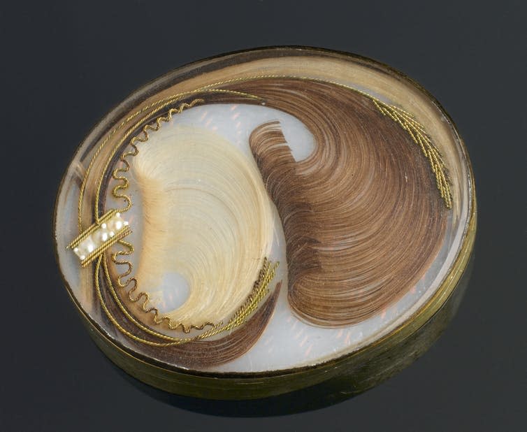 <span class="caption">Brooch containing human hair. Mourning jewellery containing hair was popular among the Victorians.</span> <span class="attribution"><a class="link " href="https://commons.wikimedia.org/wiki/File:Brooch_containing_human_hair,_Europe,_1701-1900_Wellcome_L0058632.jpg" rel="nofollow noopener" target="_blank" data-ylk="slk:Wellcome Images;elm:context_link;itc:0;sec:content-canvas">Wellcome Images</a>, <a class="link " href="http://creativecommons.org/licenses/by/4.0/" rel="nofollow noopener" target="_blank" data-ylk="slk:CC BY;elm:context_link;itc:0;sec:content-canvas">CC BY</a></span>