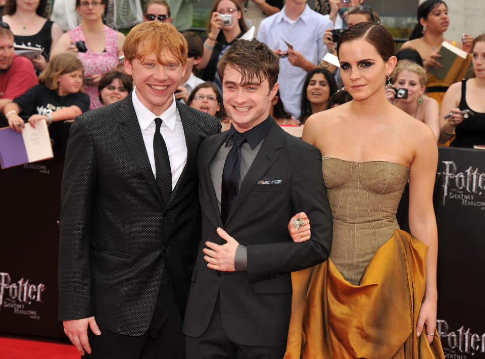 (Izquierda a derecha) Rupert Grint, Daniel Radcliffe y Emma Watson en la premier de 