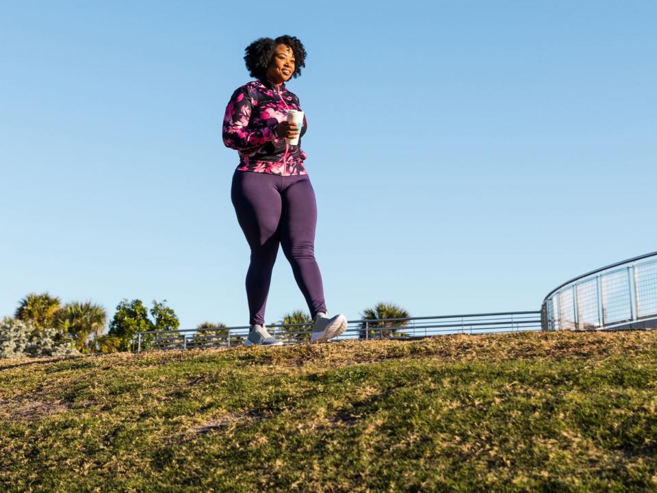 How to Get More Out of Your Walks: woman walking outdoors