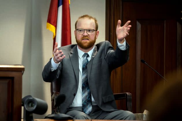 Travis McMichael speaks from the witness stand during his trial Wednesday, Nov. 17, 2021, in Brunswick, Georgia. McMichael, his father Greg McMichael and their neighbor, William 