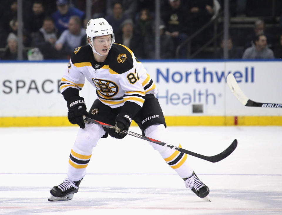 Boston Bruins rookie forward Trent Frederic used the difficult situation of him being sent down ahead of his first NHL game in his hometown to do some good for others in St. Louis. Photo from Getty Images.