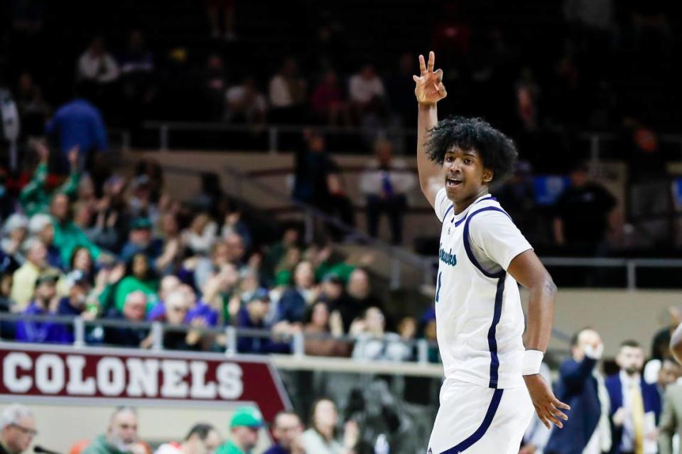 Great Crossing’s Vince Dawson celebrates making a 3-pointer against Lexington Catholic during the 11th Region Tournament semifinals on March 4.