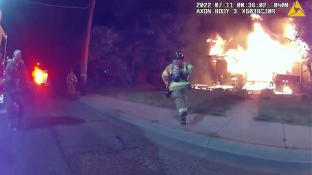 PHOTO: Bodycam video shows firefighters rushing to a house fire in Lafayette, Ind., July 11, 2022. (Lafayette Police)