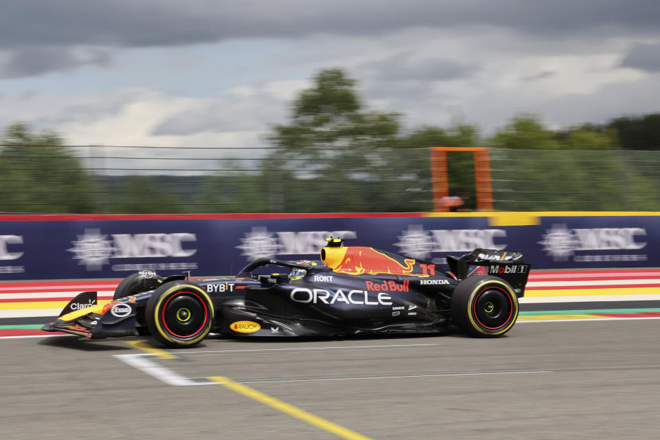 Red Bull driver Sergio Perez of Mexico steers his car during the Formula One Grand Prix at the Spa-Francorchamps racetrack in Spa, Belgium, Sunday, July 30, 2023. (AP Photo/Geert Vanden Wijngaert)
