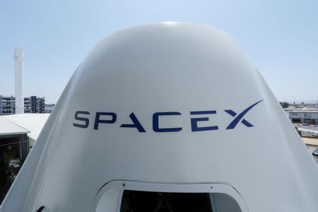 FILE PHOTO: The top of a replica Crew Dragon spacecraft is show at SpaceX headquarters in Hawthorne, California, U.S. August 13, 2018. REUTERS/Mike Blake/File Photo