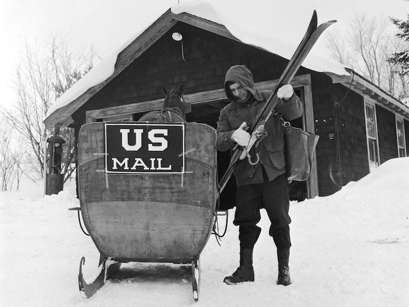 A horse-drawn mail sled in 1950