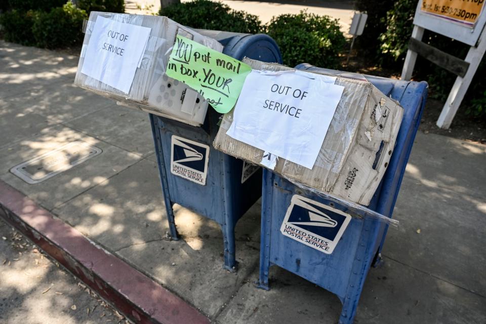 Mail deposit boxes surrounding the Acequia Post Office in Visalia are out of service Tuesday, September 26, 2023.