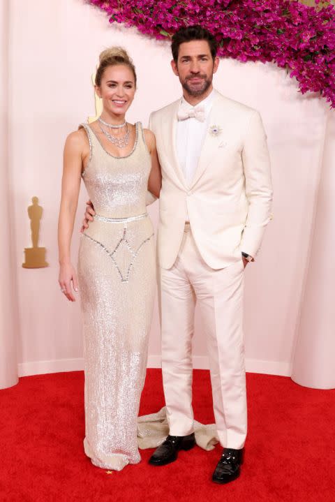 HOLLYWOOD, CALIFORNIA – MARCH 10: (L-R) Emily Blunt and John Krasinski attend the 96th Annual Academy Awards on March 10, 2024 in Hollywood, California. (Photo by John Shearer/WireImage)