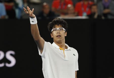 Tennis - Australian Open - Rod Laver Arena, Melbourne, Australia, January 22, 2018. South Korea's Chung Hyeon celebrates winning his match against Serbia's Novak Djokovic. REUTERS/Edgar Su