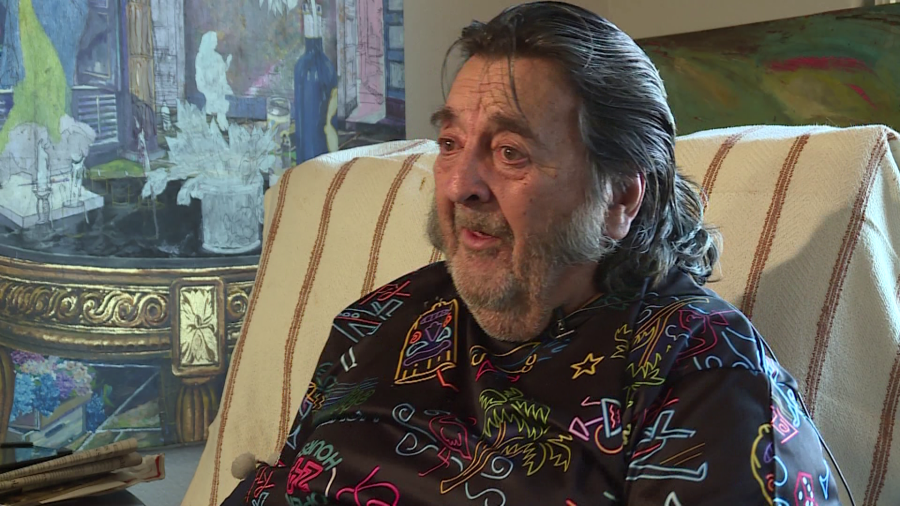 Giuseppe Aldama, 85, an Italian refugee and muralist, discusses his art. (KLAS)