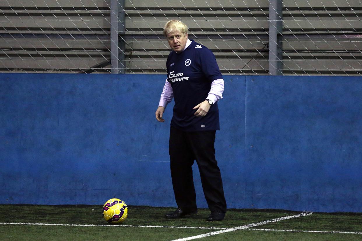 <p>File Image: Boris Johnson, the-then mayor of London, taking part in a game of football during a visit to the Millwall Football Club Community Trust on 14 January 2015 in London, England</p> (Getty Images)