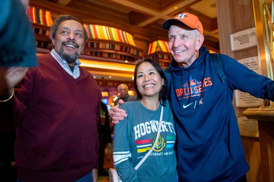 Jim McIngvale, better known as ‘Mattress Mack’, poses for photos with fans as he walks into the Beau Rivage Casino in Biloxi to make a $500,000 bet on the winner of the NCAA Men’s Basketball Tournament on Tuesday, Nov. 15, 2022.