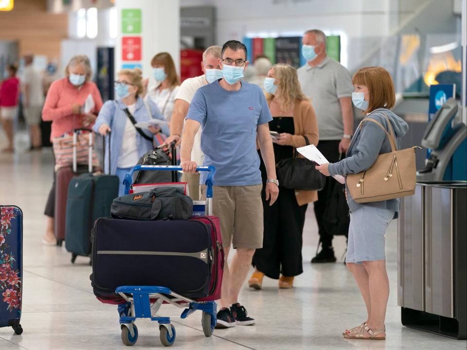 England is to allow people visiting from the US and the EU who are fully vaccinated against coronavirus to enter without the need to quarantine (Jane Barlow/PA )