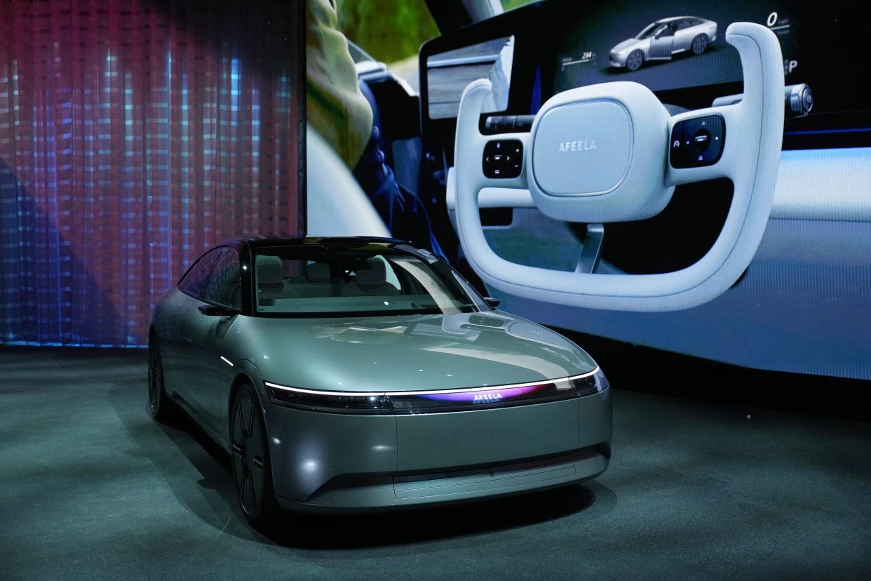 The electric vehicle prototype car Afeela, a joint venture between Sony and Honda, is on display during a Sony news conference before the start of the CES tech show Wednesday, Jan. 4, 2023, in Las Vegas. (AP Photo/John Locher)