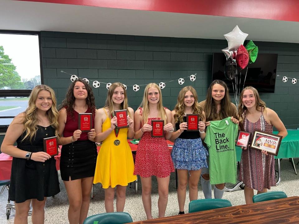 Members of the Lady Railer Soccer hold their plaques that were presented at the 2022 Lady Railer Soccer banquet.