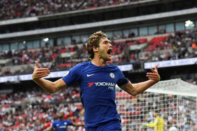 Chelsea's defender Marcos Alonso celebrates after he scored their second goal against Tottenham Hotspur on August 20, 2017