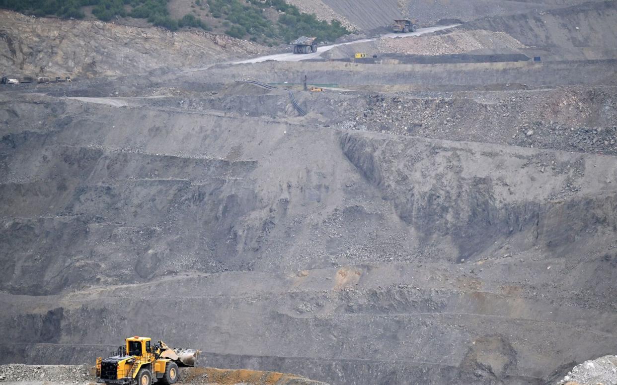 Dump trucks at the Veliki Krivelj open pit copper mine in Bor, Serbia