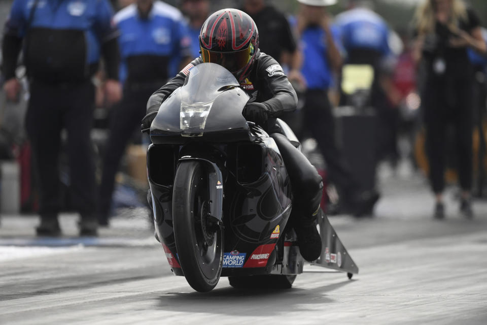 In this photo provided by the NHRA, Pro Stock Motorcycle veteran Eddie Krawiec powers his way to take the provisional No. 1 spot at the NHRA U.S. Nationals drag races at Lucas Oil Raceway in Brownsburg, Ind., Friday, Sept. 3, 2021. (Marc Gewertz/NHRA via AP)