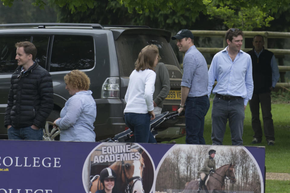 Prince William was spotted folding the pushchair away into the car. 