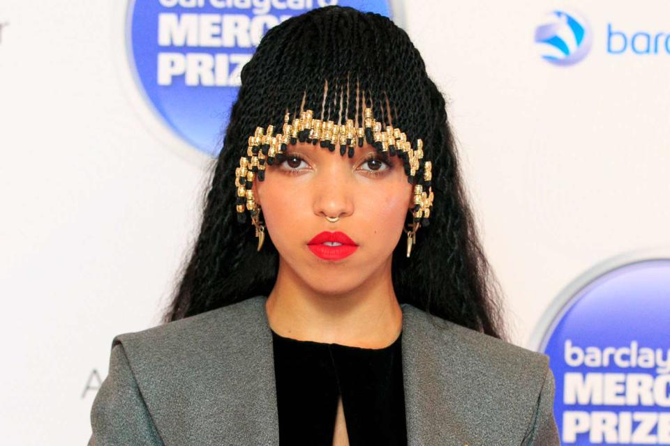 <p>John Phillips/Getty</p> FKA Twigs at the Barclaycard Mercury Prize nominations launch at The Hospital Club on September 10, 2014 in London