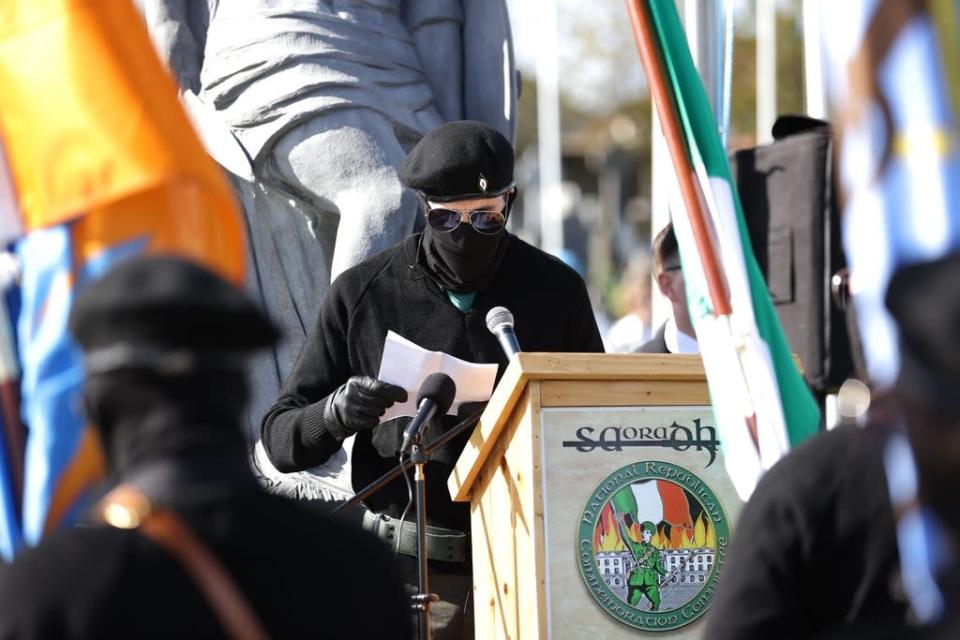 An Saoradh Colour Party member speaking at the City Cemetery in Londonderry (Liam McBurney/PA) (PA Wire)