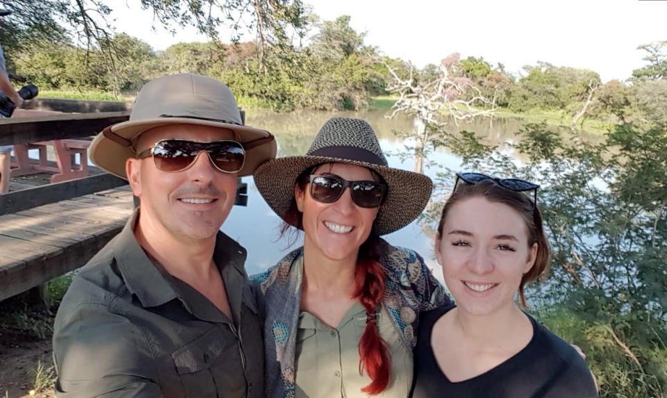 Megan Royle (right), with her mother Lindsey Mallon (centre), and step father Paul Kratovil, whose wedding Megan was attending in South Africa. Student Megan returned from the wedding to find a scorpion had stowed away in her suitcase. (PA)