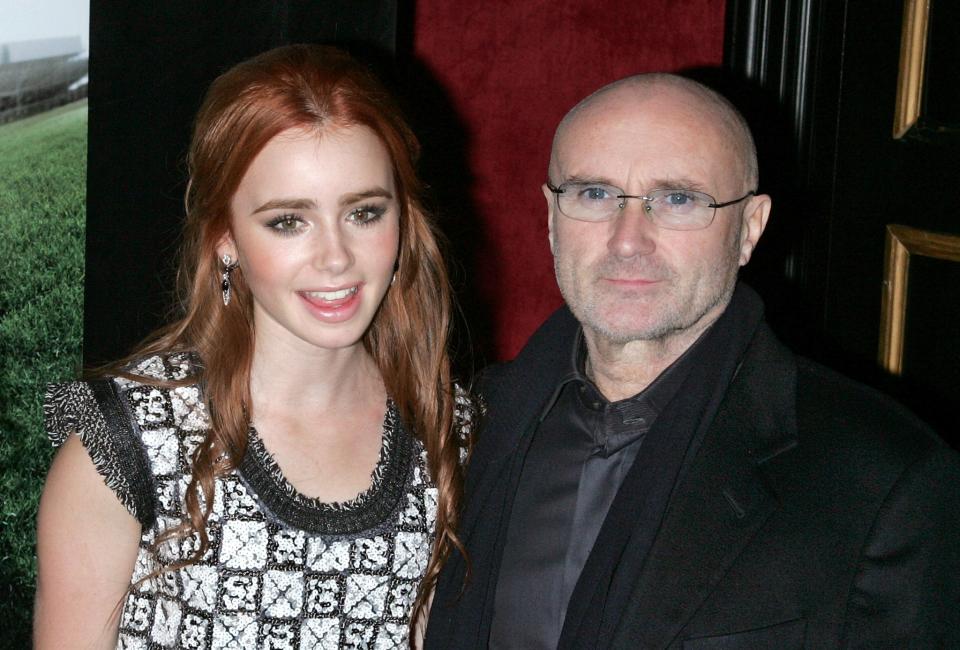 Lily mit ihrem Vater, Sänger Phil Collins. (Bild: Getty Images)