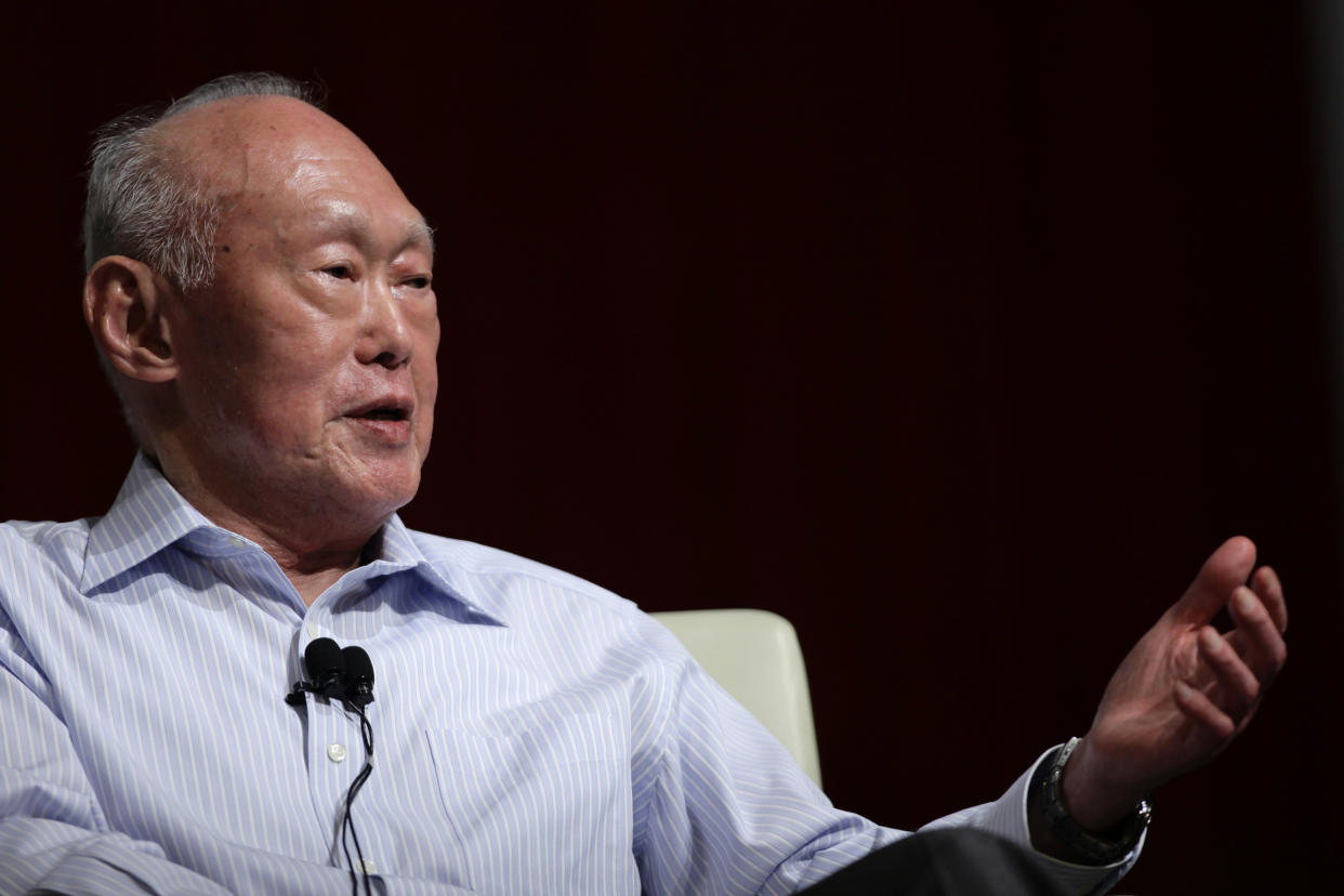 Former Singapore Prime Minister Lee Kuan Yew (LKY) gestures as he answers a question from the floor during the LKY School of Public Policy 7th anniversary dialogue session in Singapore September 14, 2011. PHOTO: Tim Chong/Reuters