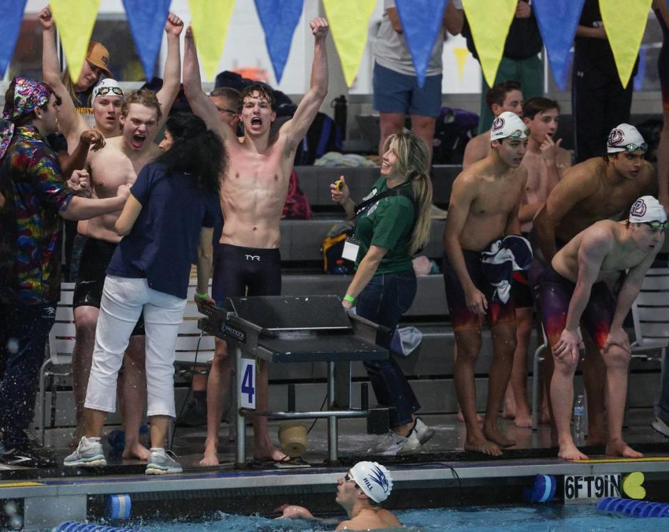 Charlotte Latin celebrates winning the boys 400 yard freestyle relay during the NCISSA state championships at Mecklenburg County Aquatic Center in Charlotte, NC on Tuesday, February 13, 2024.