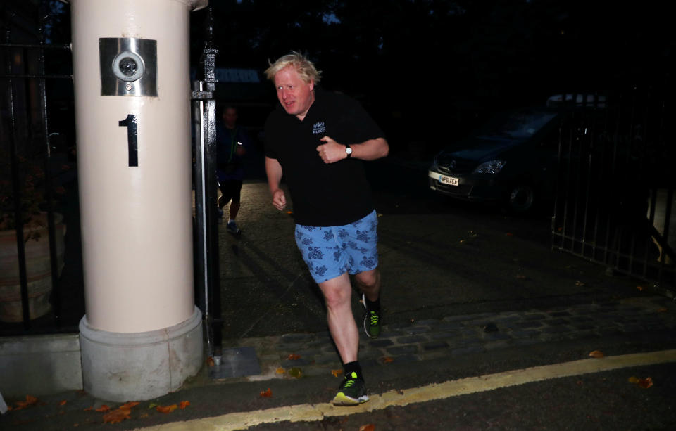 Boris Johnson leaves his home to go running in on 9 October (Reuters/Hannah McKay)