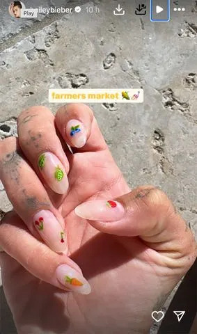 <p>Hailey Bieber /Instagram</p> Hailey Bieber's farmer's market nails