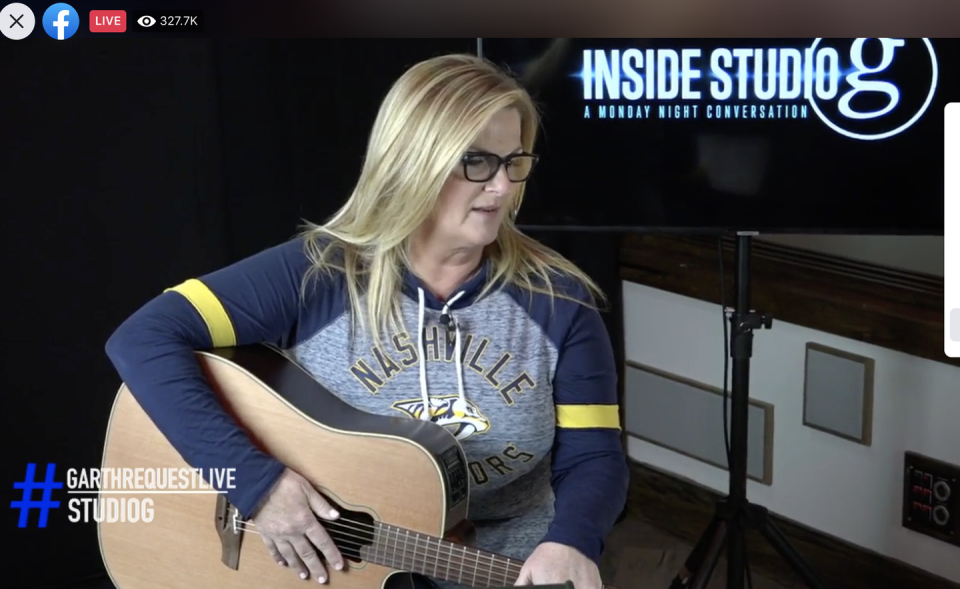 6) Trisha played guitar in front of Garth for the first time EVER.