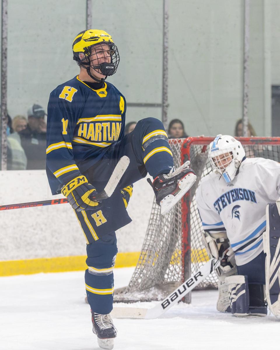 Hartland's Ben Pouliot celebrates the first of his two goals in a 3-1 victory over Livonia Stevenson on Wednesday, Jan. 26, 2022 at Eddie Edgar Ice Arena.