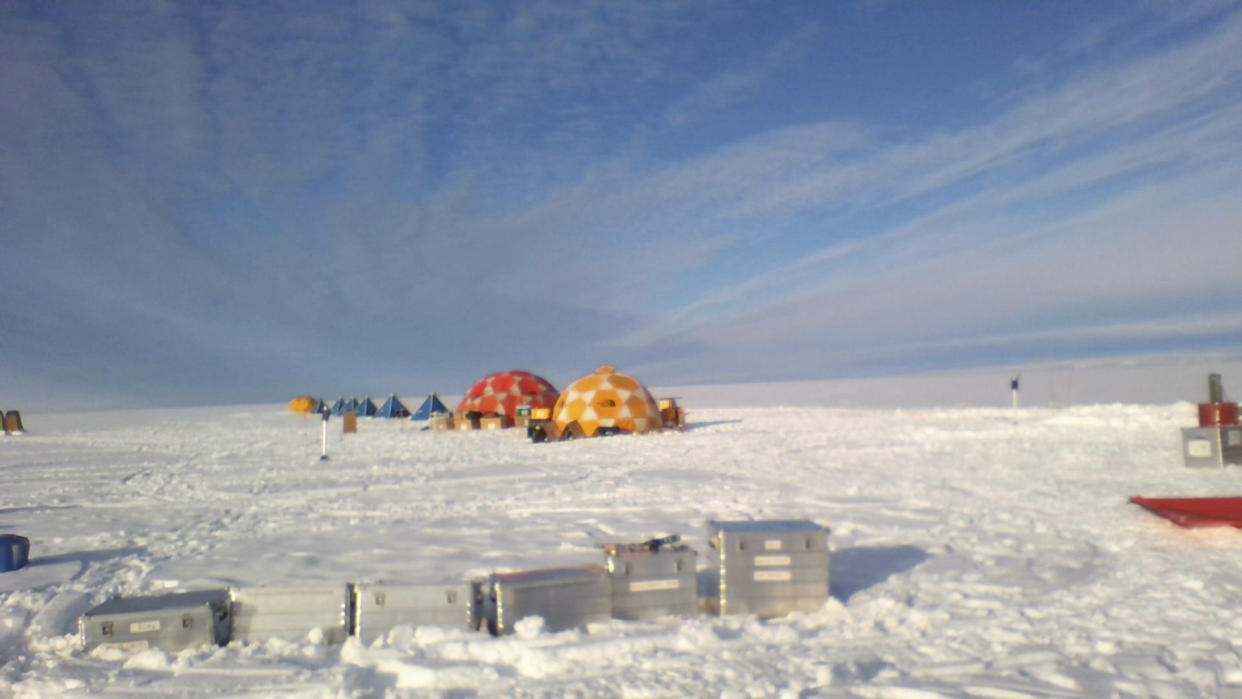 This photo provided by environmental scientist David Holland shows tents set up on the Dotson Ice Shelf in Antarctica on Monday, Jan. 31, 2022. A large iceberg broke off the deteriorating Thwaites glacier and along with sea ice it is blocking two research ships with dozens of scientists from examining how fast its crucial ice shelf is falling apart. The smaller Dotson ice shelf is about 87 miles (140 kilometers) west of the Thwaites ice shelf. (David Holland via AP)