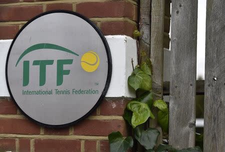 A logo is seen at the entrance to the International Tennis Federation headquarters, where the Tennis Integrity Unit is based, in London, Britain January 18, 2016. REUTERS/Toby Melville